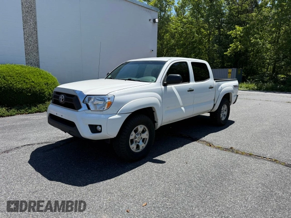 2013 Toyota Tacoma with VIN 5TFLU4EN1DX063442, listed as a Copart auction lot 62521295 with 211,682 mi miles and Clean title. Bid and sale history available at DreamBid. Image 2.