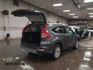2015 Honda CR-V EX-L with VIN 2HKRM4H75FH604059, listed as a IAAI auction lot 41869535 with 131,848 mi miles. Bid and sale history available at carsss.com. Image 4.