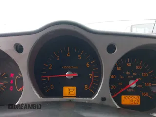 2005 Nissan 350Z Touring z VIN JN1AZ36A25M759800, wystawiony jako IAAI lot #42327063 z przebiegiem 100 940 mil mil oraz . Historia ofert i sprzedaży dostępna na DreamBid. Obrazek 7.