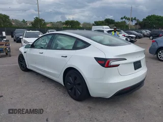 2025 Tesla Model 3 Long Range with VIN 5YJ3E1EA0SF932385, listed as a IAAI auction lot 41772613 with 1,683 mi miles and . Bid and sale history available at carsss.com. Image 3.