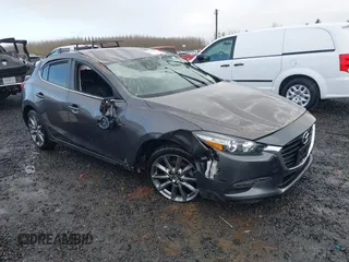 2018 Mazda 3 Touring z VIN 3MZBN1L35JM208666, wystawiony jako IAAI lot #41858337 z przebiegiem Nie podano mil oraz . Historia ofert i sprzedaży dostępna na DreamBid. Obrazek 1.