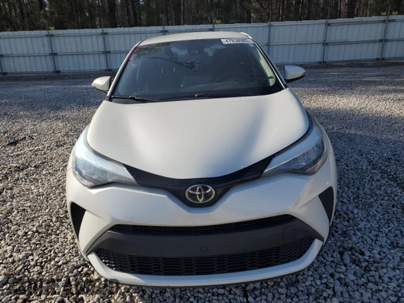 2021 Toyota C-HR LE with VIN NMTKHMBX8MR121525, listed as a Copart auction lot 47858985 with 87,809 mi miles and Salvage Title. Bid and sale history available at carsss.com. Image 5.