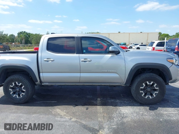 2023 Toyota Tacoma SR z VIN 3TMCZ5AN0PM627654, wystawiony jako IAAI lot #42157641 z przebiegiem 35 015 mil mil oraz . Historia ofert i sprzedaży dostępna na DreamBid. Obrazek 14.