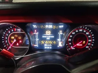 2020 Jeep Gladiator Rubicon z VIN 1C6JJTBGXLL178893, wystawiony jako IAAI lot #42206863 z przebiegiem 29 138 mil mil oraz . Historia ofert i sprzedaży dostępna na DreamBid. Obrazek 7.