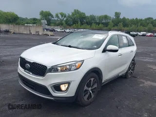 2017 Kia Sorento EX with VIN 5XYPHDA55HG336810, listed as a IAAI auction lot 39946463 with 129,876 mi miles and . Bid and sale history available at carsss.com. Image 2.