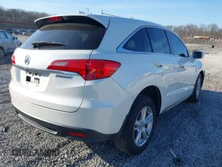 2014 Acura RDX with VIN 5J8TB3H39EL001775, listed as a IAAI auction lot 41488623 with 146,666 mi miles and . Bid and sale history available at DreamBid. Image 4.