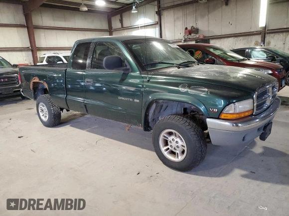 1999 Dodge Dakota SLT with VIN 1B7GG22Y9XS299933, listed as a Copart auction lot 82360644 with 146,506 mi miles and Clean Title. Bid and sale history available at DreamBid. Image 4.