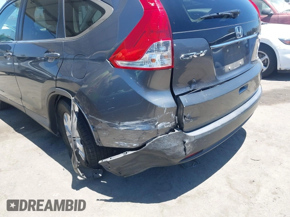 2013 Honda CR-V EX-L with VIN 2HKRM4H76DH646060, listed as a IAAI auction lot 42624207 with 208,519 mi miles and . Bid and sale history available at DreamBid. Image 6.
