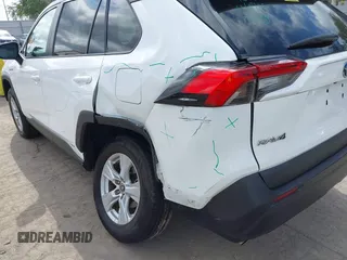 2021 Toyota RAV4 Hybrid XLE with VIN 2T3RWRFV6MW114082, listed as a IAAI auction lot 42038315 with 50,009 mi miles. Bid and sale history available at carsss.com. Image 6.