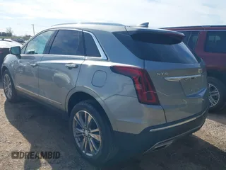 2025 Cadillac XT5 FWD Premium Luxury with VIN 1GYKNCRS1SZ120351, listed as a IAAI auction lot 41334881 with 4,915 mi miles. Bid and sale history available at carsss.com. Image 3.