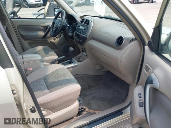 2003 Toyota RAV4 with VIN JTEGH20V830102676, listed as a IAAI auction lot 42470002 with 210,984 mi miles and . Bid and sale history available at DreamBid. Image 5.