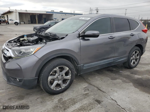 2019 Honda CR-V EX-L with VIN JHLRW2H84KX011642, listed as a Copart auction lot 86776954 with 70,969 mi miles and Salvage Title. Bid and sale history available at carsss.com. Image 1.