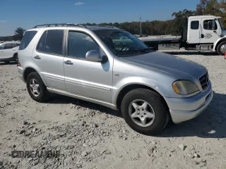 2000 Mercedes-Benz M-Class with VIN 4JGAB54E3YA158805, listed as a Copart auction lot 78047374 with 234,568 mi miles and Salvage Title. Bid and sale history available at carsss.com. Image 4.