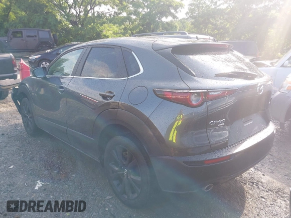 2024 Mazda CX-30 S Select Sport z VIN 3MVDMBBM1RM634542, wystawiony jako IAAI lot #42204673 z przebiegiem 24 694 mil mil oraz . Historia ofert i sprzedaży dostępna na DreamBid. Obrazek 3.