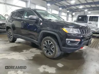 2019 Jeep Compass Trailhawk with VIN 3C4NJDDB4KT647187, listed as a Copart auction lot 50260575 with 63,098 mi miles and Salvage Title. Bid and sale history available at carsss.com. Image 4.