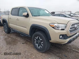2016 Toyota Tacoma SR with VIN 5TFCZ5ANXGX012426, listed as a IAAI auction lot 41607566 with 128,967 mi miles. Bid and sale history available at carsss.com. Image 1.