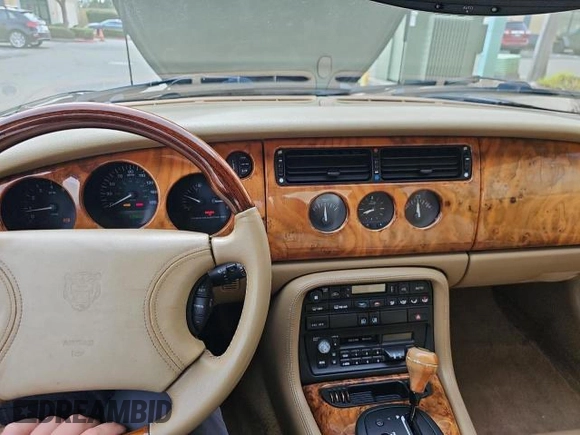 1997 Jaguar XK with VIN SAJGX5747VC007213, listed as a Copart auction lot 45953175 with 82,461 mi miles and Clean Title. Bid and sale history available at DreamBid. Image 9.