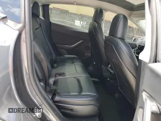 2021 Tesla Model Y Long Range z VIN 5YJYGAEE8MF208854, wystawiony jako Copart lot #56382535 z przebiegiem 47 531 mil mil oraz Nie do naprawy • Non repairable. Historia ofert i sprzedaży dostępna na DreamBid. Obrazek 10.