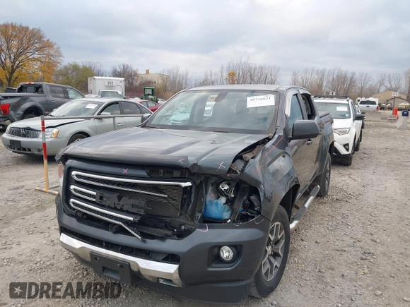 2016 GMC Canyon 4WD SLE with VIN 1GTG6CE38G1165896, listed as a IAAI auction lot 40716621 with 116,684 mi miles. Bid and sale history available at carsss.com. Image 6.