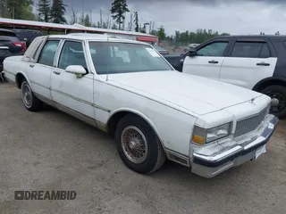 1990 Chevrolet Caprice z VIN 1G1BU54E9LA105479, wystawiony jako IAAI lot #42277687 z przebiegiem 30 947 mil mil oraz . Historia ofert i sprzedaży dostępna na DreamBid. Obrazek 1.