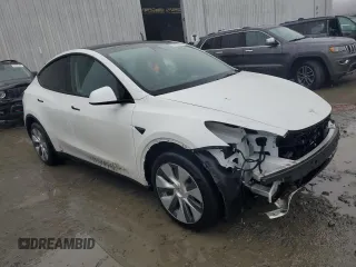 2023 Tesla Model Y Long Range z VIN 7SAYGDEE1PA114563, wystawiony jako Copart lot #44423505 z przebiegiem Nie podano mil oraz Szkody całkowita. Historia ofert i sprzedaży dostępna na DreamBid. Obrazek 4.