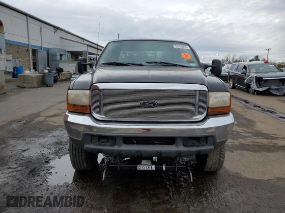 2000 Ford F-250 XL with VIN 1FTNX21L5YEC66604, listed as a Copart auction lot 51754055 with 167,798 mi miles and Salvage title. Bid and sale history available at DreamBid. Image 5.