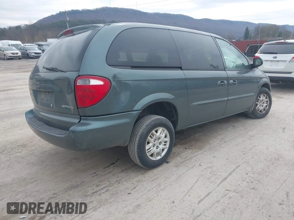2003 Dodge Grand Caravan with VIN 2D4GP44313R240791, listed as a IAAI auction lot 41937009 with 231,913 mi miles and . Bid and sale history available at DreamBid. Image 4.