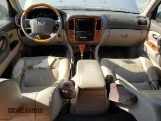 2002 Lexus LX 470 z VIN JTJHT00W723519186, wystawiony jako Copart lot #70190464 z przebiegiem 306 793 mil mil oraz Tytuł czysty. Historia ofert i sprzedaży dostępna na DreamBid. Obrazek 8.