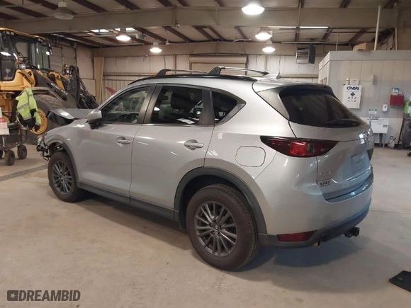 2019 Mazda CX-5 Touring with VIN JM3KFACM7K1551252, listed as a IAAI auction lot 41580918 with NaN miles. Bid and sale history available at carsss.com. Image 3.