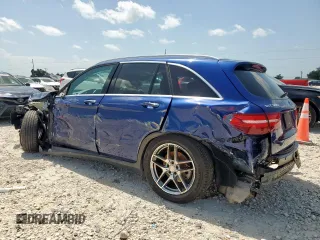 2017 Mercedes-Benz GLC 300 with VIN WDC0G4JB2HF130125, listed as a Copart auction lot 61576685 with 94,643 mi miles and Salvage title. Bid and sale history available at DreamBid. Image 2.
