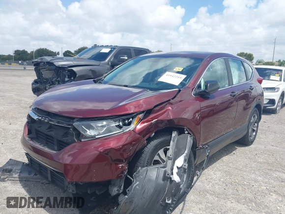 2019 Honda CR-V LX with VIN 2HKRW5H33KH402697, listed as a IAAI auction lot 41942219 with 80,826 mi miles. Bid and sale history available at carsss.com. Image 6.