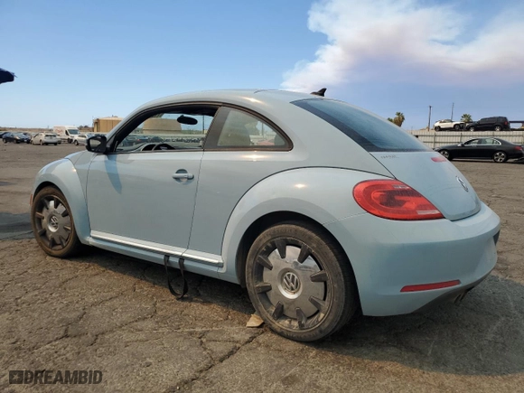 2012 Volkswagen Beetle 2.5L w/Sound/Nav PZEV with VIN 3VWJP7AT6CM656364, listed as a Copart auction lot 71071434 with 0 mi miles and Salvage Title. Bid and sale history available at carsss.com. Image 2.