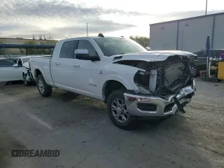 2020 Ram 3500 Laramie z VIN 3C63R3MLXLG293695, wystawiony jako Copart lot #45008095 z przebiegiem 102 028 mil mil oraz Szkoda całkowita • Salvage title. Historia ofert i sprzedaży dostępna na DreamBid. Obrazek 11.