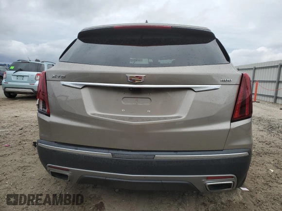 2022 Cadillac XT5 FWD Premium Luxury with VIN 1GYKNCRS1NZ117079, listed as a Copart auction lot 41448805 with 17,552 mi miles and Salvage title. Bid and sale history available at DreamBid. Image 6.