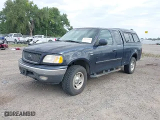 2000 Ford F-150 XL with VIN 1FTRX18L6YNB68229, listed as a IAAI auction lot 40141907 with 1 mi miles. Bid and sale history available at carsss.com. Image 2.
