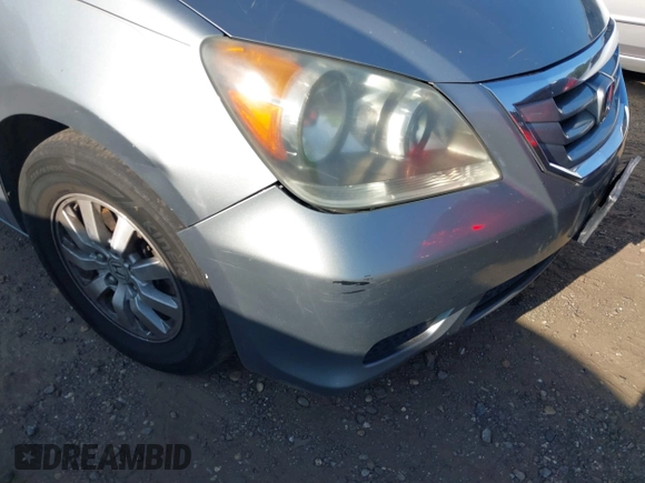 2008 Honda Odyssey EX-L with VIN 5FNRL38718B053448, listed as a IAAI auction lot 40182359 with 164,902 mi miles and . Bid and sale history available at DreamBid. Image 6.