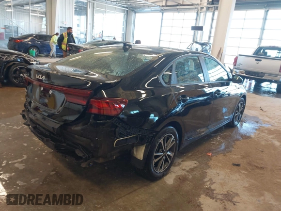 2022 Kia Forte LXS with VIN 3KPF24AD5NE484890, listed as a IAAI auction lot 41006516 with 39,213 mi miles and . Bid and sale history available at DreamBid. Image 4.