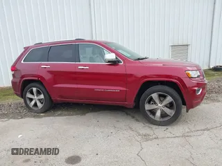 2015 Jeep Grand Cherokee High Altitude with VIN 1C4RJECG7FC884942, listed as a IAAI auction lot 41852796 with 110,454 mi miles. Bid and sale history available at carsss.com. Image 13.