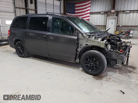 2019 Dodge Grand Caravan GT with VIN 2C4RDGEG9KR694822, listed as a Copart auction lot 50959695 with 121,697 mi miles and Salvage Title. Bid and sale history available at DreamBid. Image 4.