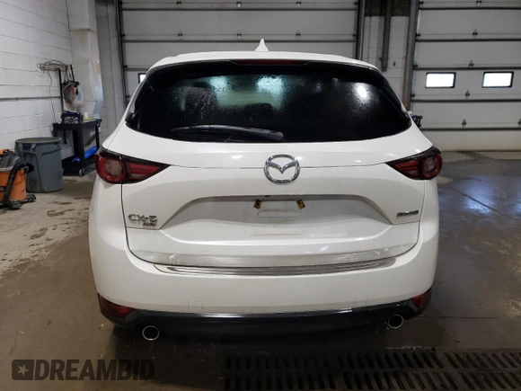 2020 Mazda CX-5 Grand Touring with VIN JM3KFBDM5L1851734, listed as a Copart auction lot 56729585 with 39,023 mi miles and Salvage title. Bid and sale history available at DreamBid. Image 6.