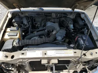 2000 Ford Ranger XL z VIN 1FTYR14V0YTA89549, wystawiony jako Copart lot #55728585 z przebiegiem 179 336 mil mil oraz Szkoda całkowita • Salvage title. Historia ofert i sprzedaży dostępna na DreamBid. Obrazek 11.