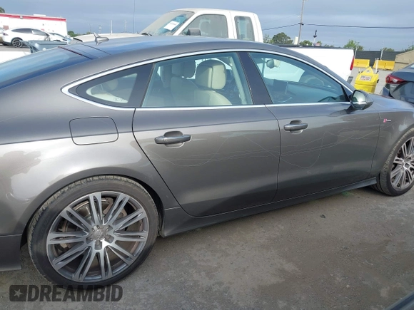 2012 Audi A7 Prestige с VIN WAU2GAFC7CN122113, выставлен на аукционе IAAI как лот 42111441 с пробегом 149 617 миль миль и . История ставок и продаж доступна на DreamBid. Изображение 13.