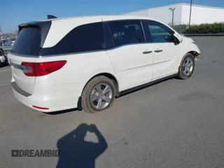 2018 Honda Odyssey EX-L z VIN 5FNRL6H79JB014419, wystawiony jako IAAI lot #41654269 z przebiegiem 84 372 mil mil oraz . Historia ofert i sprzedaży dostępna na DreamBid. Obrazek 4.