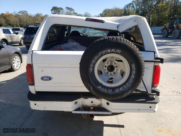 1996 Ford Bronco XL with VIN 1FMEU15N4TLB67027, listed as a Copart auction lot 75346314 with NaN miles and Salvage Title. Bid and sale history available at carsss.com. Image 6.