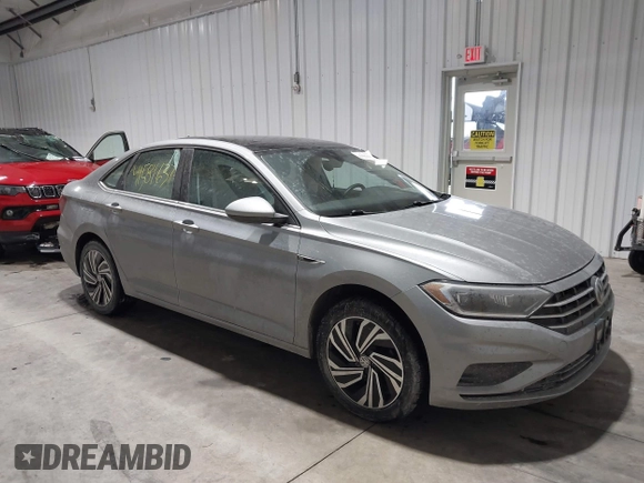 2020 Volkswagen Jetta SEL z VIN 3VWE57BU0LM087350, wystawiony jako IAAI lot #41581637 z przebiegiem 60 528 mil mil oraz . Historia ofert i sprzedaży dostępna na DreamBid. Obrazek 13.