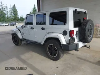 2012 Jeep Wrangler Unlimited Sahara with VIN 1C4BJWEG7CL275883, listed as a IAAI auction lot 42510764 with 149,531 mi miles and . Bid and sale history available at DreamBid. Image 3.