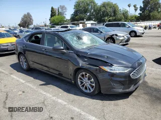 2020 Ford Fusion SE with VIN 3FA6P0HDXLR150768, listed as a Copart auction lot 57085365 with 141,855 mi miles and Salvage title. Bid and sale history available at DreamBid. Image 4.