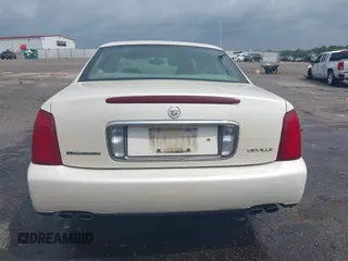 2003 Cadillac DeVille z VIN 1G6KD54Y03U182728, wystawiony jako IAAI lot #42080577 z przebiegiem 193 152 mil mil oraz . Historia ofert i sprzedaży dostępna na DreamBid. Obrazek 16.