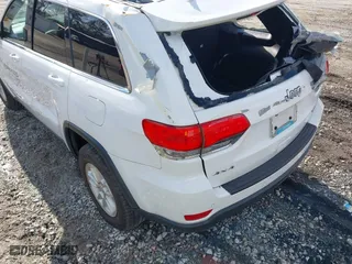 2018 Jeep Grand Cherokee Laredo E with VIN 1C4RJFAG8JC424609, listed as a IAAI auction lot 41124689 with 101,643 mi miles. Bid and sale history available at carsss.com. Image 6.