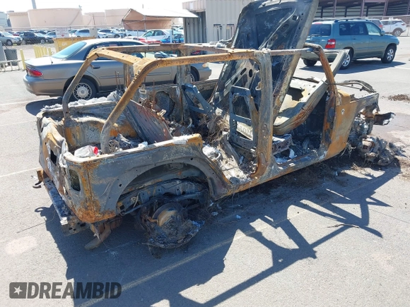 2015 Jeep Wrangler Unlimited Willys Wheeler with VIN 1C4BJWDG0FL751574, listed as a IAAI auction lot 41604064 with Not Provided miles and . Bid and sale history available at DreamBid. Image 4.